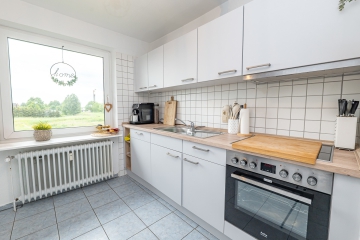 Willkommen in Ihrem neuen Zuhause – 3-Zimmer-Wohnung mit Wohlfühlcharakter - Küche