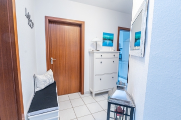 Zeitlos attraktiv & solide vermietet: 2-Zimmer-Erdgeschosswohnung mit Südterrasse in gepflegter Lage - Badezimmer