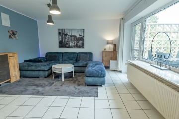 Gepflegte 3-Zimmer-Erdgeschosswohnung mit Terrasse in ruhiger Wohnlage - Wohnzimmer
