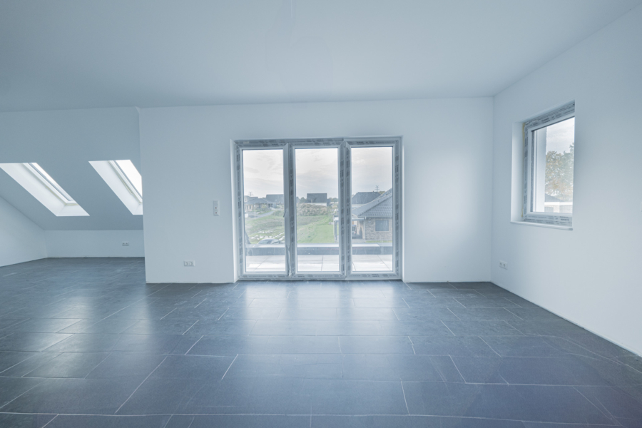 Elegantes Wohnen im Mehrfamilienhaus: 3-Zimmer-Wohnung im Obergeschoss rechts - Am Wohnpark Hamfeld - Wohnbereich