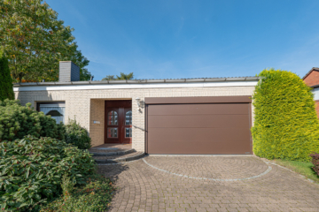 Exklusives Architektenhaus in idyllischer Hanglage – Ihr Rückzugsort nahe der Barger Heide! - Garage