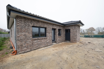 Seitenansicht - Einzug ins Moderne – ebenerdige Doppelhaushälfte mit Wohlfühlgrundriss