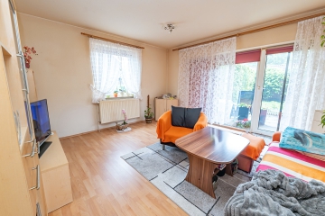 2-Zimmer-Wohnung mit Terrasse und Stellplatz – auch für Kapitalanleger interessant - Wohnzimmer