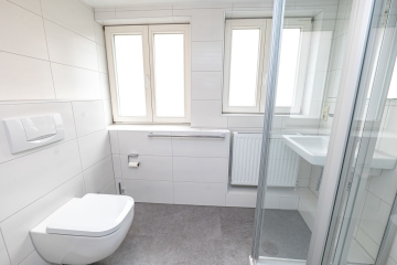 Altstadtflair trifft moderne Architektur – Stilvolle Eigentumswohnung mit Eleganz und Charakter - Badezimmer