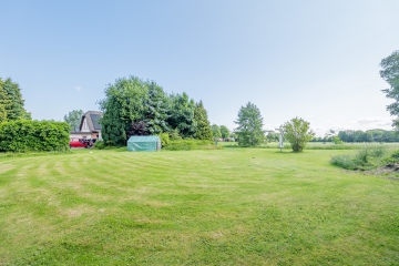Garten - Attraktive Immobilie mit drei Einheiten und freiem Blick ins Grüne!