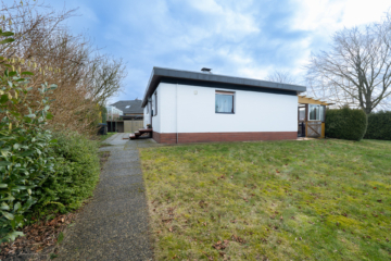 Gemütlicher Bungalow mit großzügigem Grundstück und vielseitigem Potenzial - Zugang zum Garten