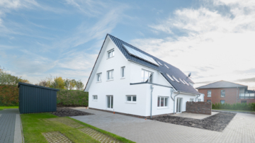 Elegantes Wohnen im Mehrfamilienhaus: 3-Zimmer-Wohnung im Erdgeschoss rechts - Am Wohnpark Hamfeld - Außenansicht